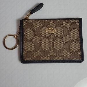 Coach Skinny ID case